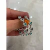 PENDIENTES DE ARO CON CORAZONES BICOLOR
