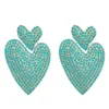 PENDIENTES DOS CORAZONES TURQUESAS