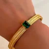 PULSERA DORADA DE ACERO CRISTAL VERDE ESMERALDA