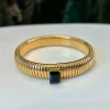 PULSERA DORADA PIEDRA NEGRA