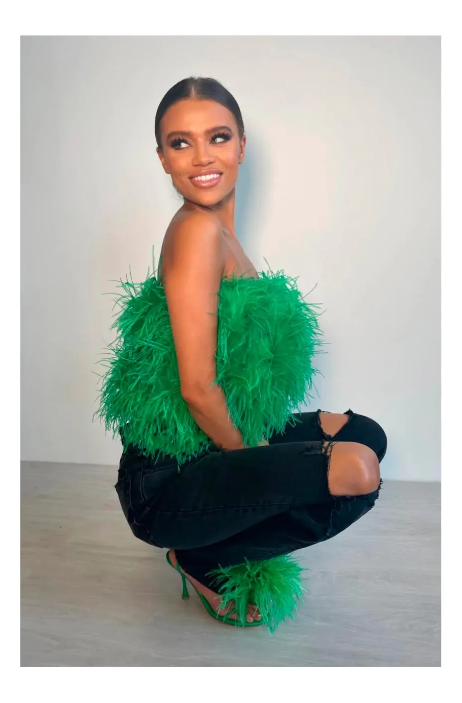 TOP DE PLUMAS VERDE ESMERALDA